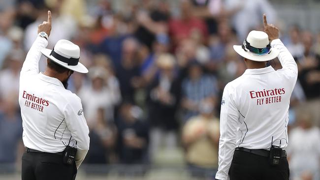 BIRMINGHAM, ENGLAND — AUGUST 03: Umpire Aleem Dar and Umpire Joel Wilson signal out during day three of the 1st Specsavers Ashes Test between England and Australia at Edgbaston on August 03, 2019 in Birmingham, England. (Photo by Ryan Pierse/Getty Images)