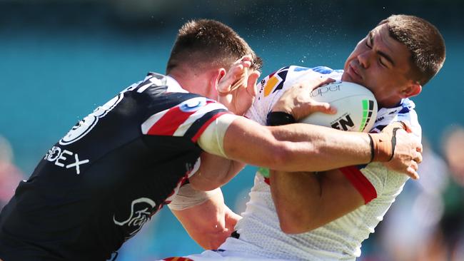 Victor Radley put a big hit on Knights five-eighth Jake Clifford. Picture: Matt King/Getty Images