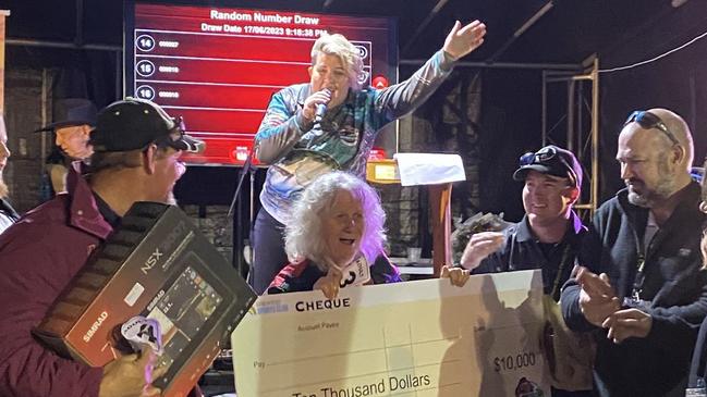 Ashleigh Jensen announces the top prize winner of the 2023 Rainbow Beach Fishing Classic, Wendy Blake, who took home $10,000.