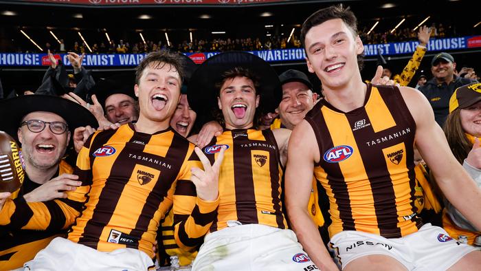 MELBOURNE, AUSTRALIA - SEPTEMBER 06: Jack Ginnivan, Nick Watson and Connor Macdonald of the Hawks pose for a photo during the 2024 AFL Second Elimination Final match between the Western Bulldogs and the Hawthorn Hawks at The Melbourne Cricket Ground on September 06, 2024 in Melbourne, Australia. (Photo by Dylan Burns/AFL Photos via Getty Images)