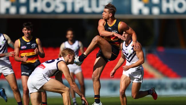 Ben Keays of the Crows kicks during his side’s Round 5 loss to the Dockers at Metricon Stadium on Sunday. Picture: Getty Images