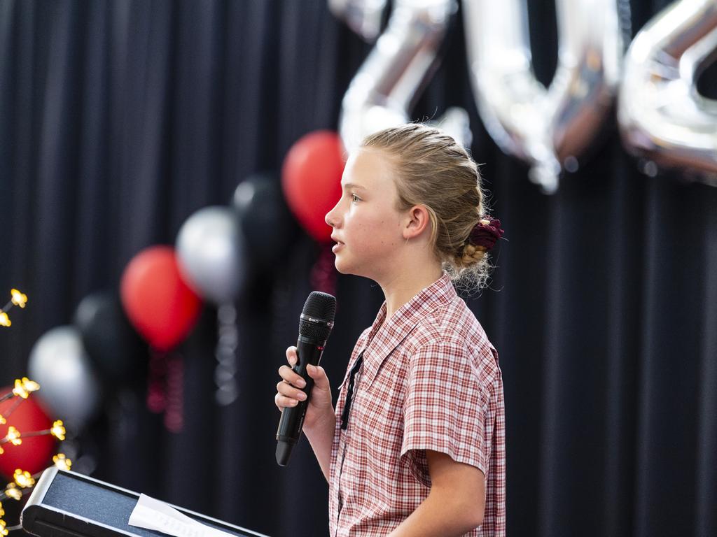 Sacred Heart Primary School Year 5 student Clare Cox farewells the Year 6 students at the awards presentation and Yr 6 graduation, Friday, December 2, 2022. Picture: Kevin Farmer