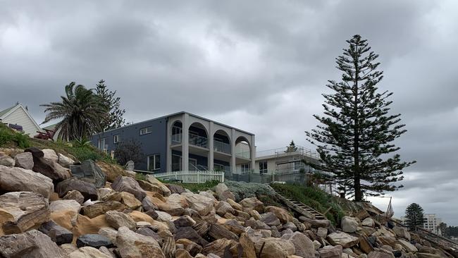 The rocks guarding homes on Collaroy Beach have been battered by waves. Picture: Madelaine Wong