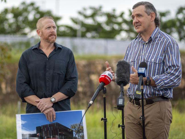 Corporate and Digital Development Minister Paul Kirby, NEXTDC chief executive holding an impression of the soon to be Darwin Data Centre with Chief Minister Michael Gunner. Picture: Floss Adams.