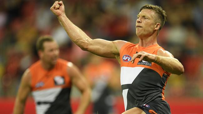 Rhys Palmer celebrates after kicking a goal. (Photo by Brett Hemmings/AFL Media/Getty Images)