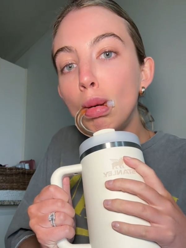 Another content creator couldn’t get over how funny it looked to drink through the straw. Picture: @rachelmadisoncarlisle/TikTok