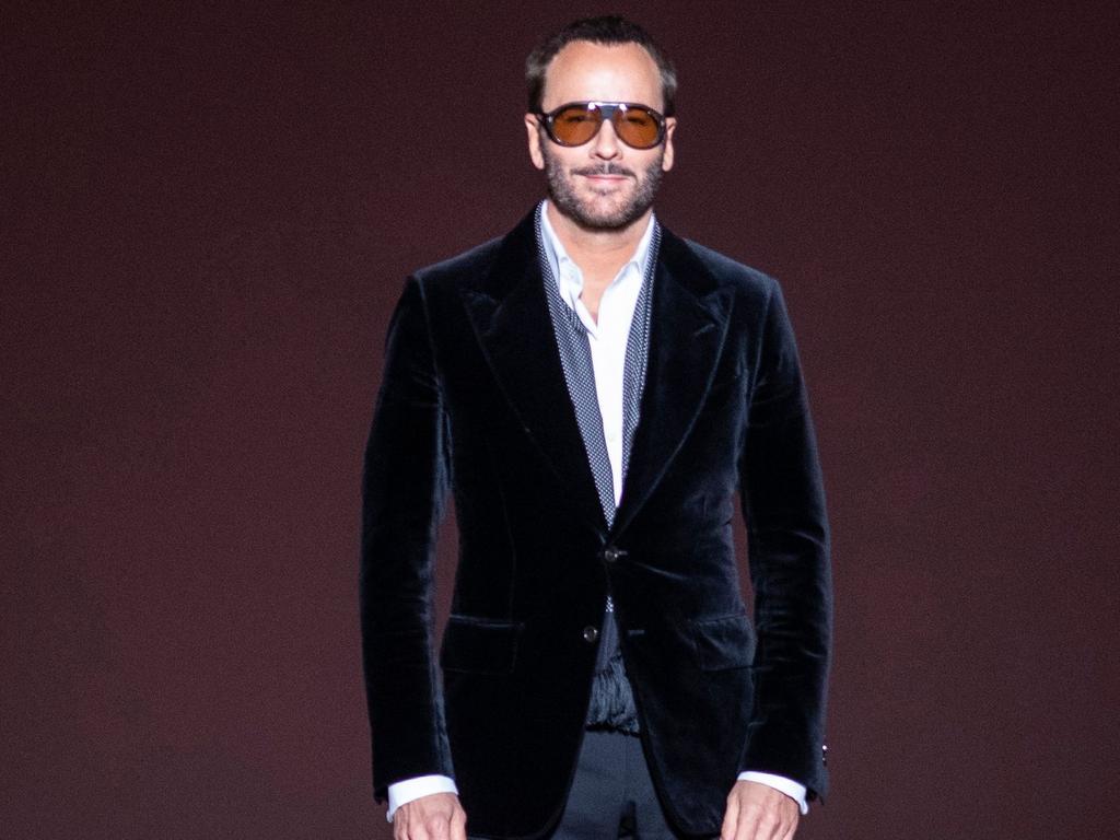 Tom Ford appears on the runway after his fashion show. Picture: AFP 