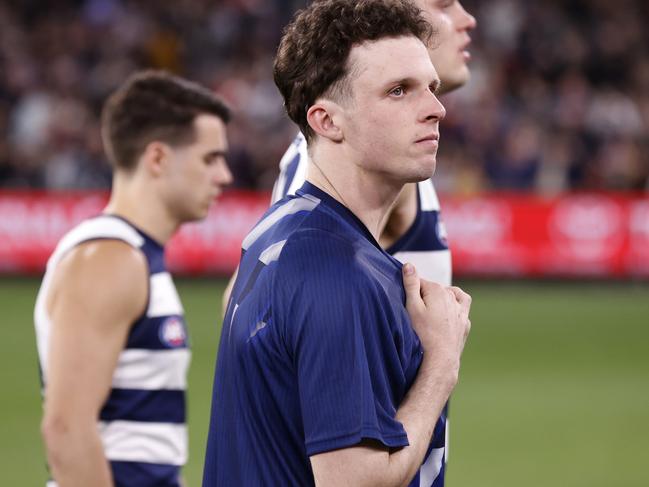 MELBOURNE, AUSTRALIA - SEPTEMBER 21: A dejected Max Holmes of the Cats walks from the ground after the AFL Preliminary Final match between Geelong Cats and Brisbane Lions at Melbourne Cricket Ground, on September 21, 2024, in Melbourne, Australia. (Photo by Darrian Traynor/AFL Photos/via Getty Images)