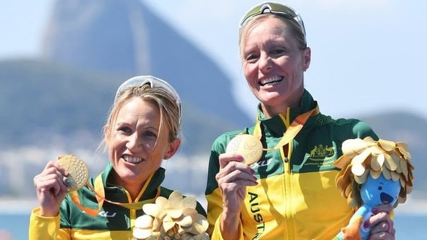 Katie Kelly (left) won gold at the 2016 Rio Paralympics, pictured here with guide Michelle Jones. Kelly said the medals all were inscribed with braille and had distinct rattles signifying the medal’s colour.