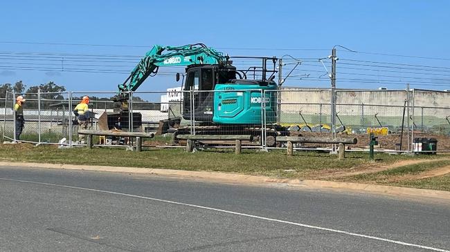 Gold Coast City Council workers at Yatala in the city's north working on fixing sewer pipelines.