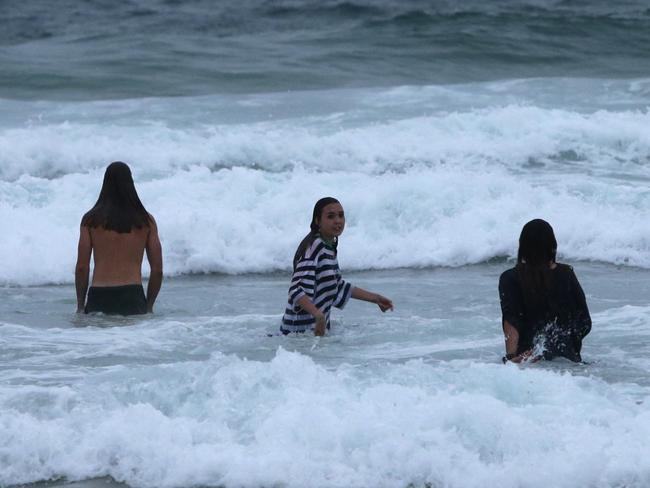 What a wake up call! Some people jumped into the water at Bondi Beach early on New Year’s Day. Picture: Bill Hearne