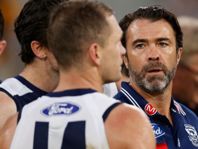 MELBOURNE, AUSTRALIA - APRIL 18: Chris Scott, Senior Coach of the Cats addresses his players during the 2022 AFL Round 05 match between the Hawthorn Hawks and the Geelong Cats at the Melbourne Cricket Ground on April 18, 2022 In Melbourne, Australia. (Photo by Michael Willson/AFL Photos via Getty Images)