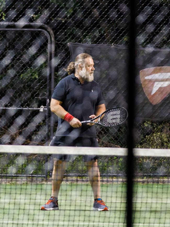 Russell Crowe enjoying a game of tennis in Paddington. Picture: Tim Pascoe