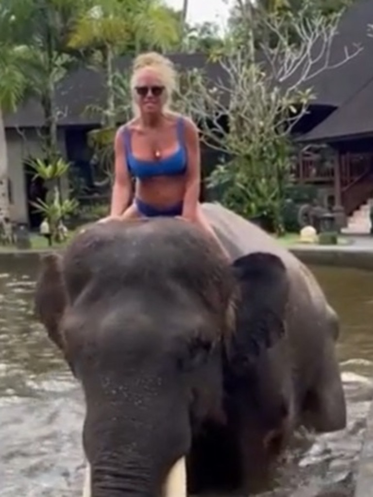 Beth pictured on an elephant moments before the ordeal.