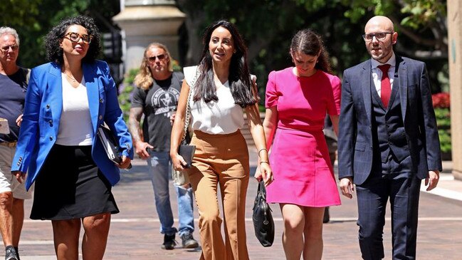 Antoinette Lattouf, second from left, pictured after leaving a Fair Work Commission hearing. Picture: AAP