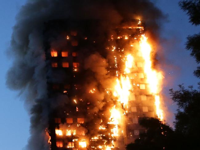 There were chaotic scenes as fire engulfed Grenfell Tower, a residential apartment block in west London, killing at least six residents. Picture: AFP