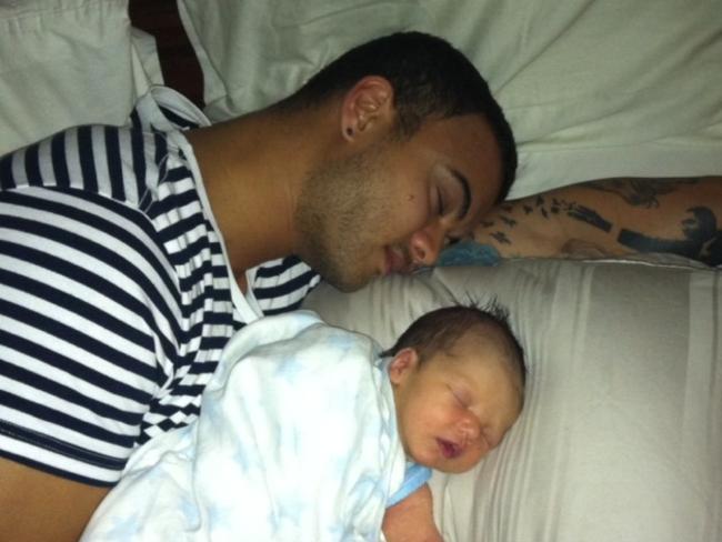 When Hudson was a baby, his Dad tweeted: ”Morning cuddles with the champion.” Picture: Twitter