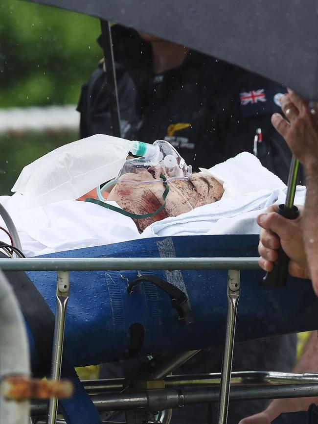 A patient arrives in a helicopter at Townsville hospital after a crash on Hamilton Island. Picture: Zak Simmonds