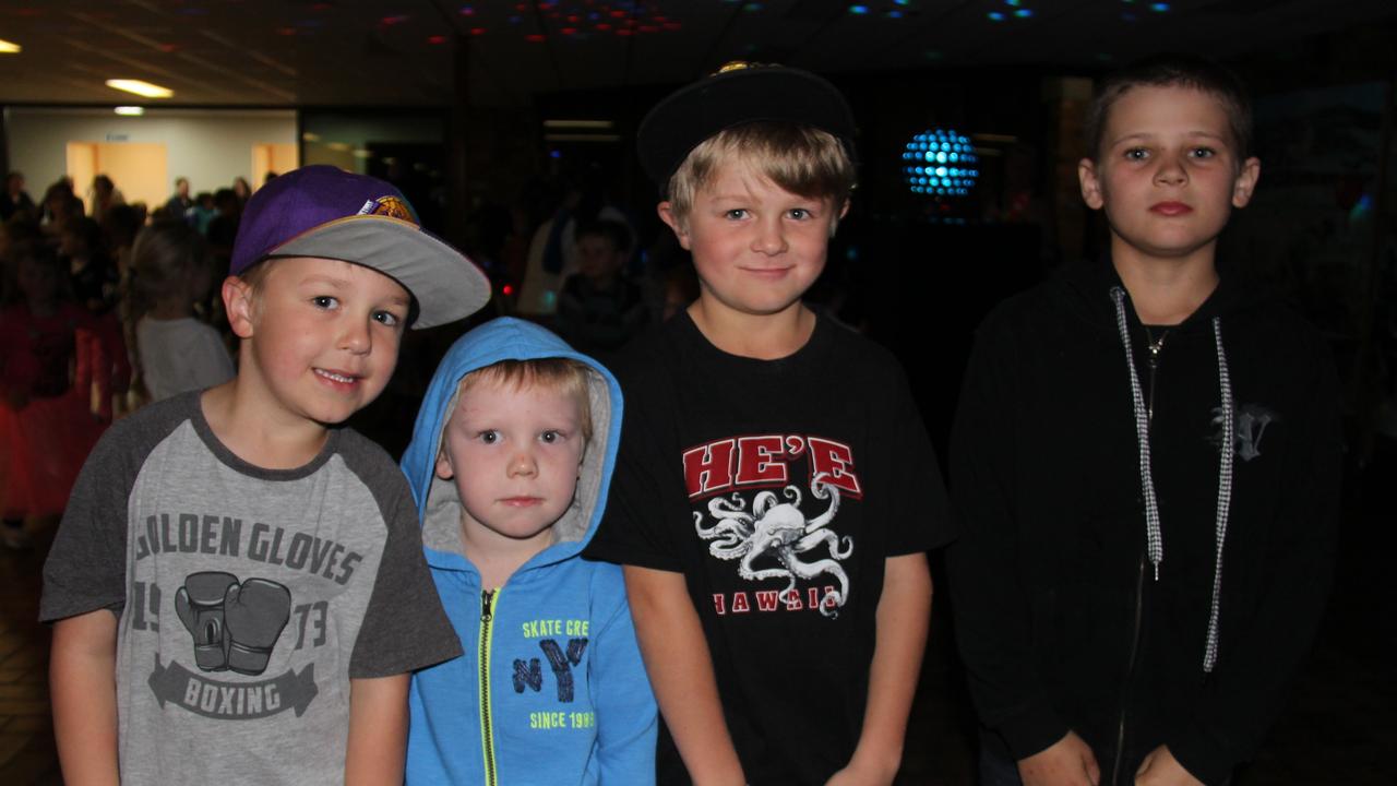 Lucas Dunbar, Gage Tanner, Dean Dunbar and Beau Doorley at the Blue Light disco on Friday. Photo Erin Smith / Stanthorpe Border Post