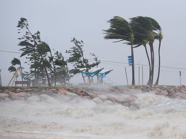 TOWNSVILLE, AUSTRALIA - FEBRUARY 03: Strong winds are seen hitting a section of the 'Strand' on February 3, 2011 in Townsville, Australia. So far no deaths or serious injuriees have been reported following Cyclone Yasi which struck land as a category five storm around midnight yesterday. The Queensland towns of Innisvail, Mission Beach, Tully and Cardwell where hit hardest by Yasi with authorities waiting for safer conditions to assess the full extent of the damage. Yasi has been downgraded to a category two storm as it passes inland. (Photo by Ian Hitchcock/Getty Images)