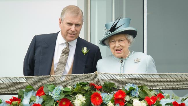 Prince Andrew and Queen Elizabeth in June 2013. Picture: AFP PHOTO/Leon Neal.