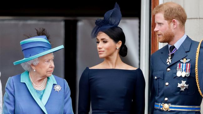 The Queen, Meghan and Harry on the balcony of Buckingham Palace on July 10, 2018. Picture: Max Mumby/Indigo/Getty Images