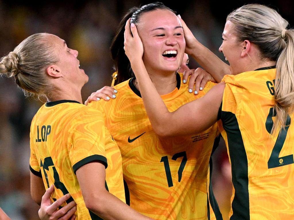Amy Sayer (centre) will return for the Matildas against Argentina. Picture: William West / AFP