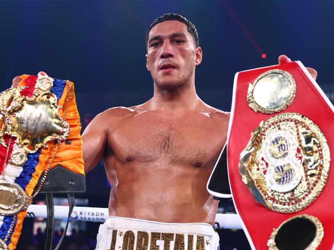 Opetaia with his Ring Magazine and IBF titles. Picture: Chris Hyde/Getty Images