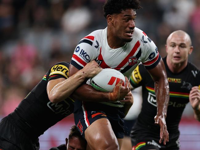 SYDNEY, AUSTRALIA - MARCH 14: Siua Wong of the Roosters is tackled during the round two NRL match between Penrith Panthers and Sydney Roosters at CommBank Stadium, on March 14, 2025, in Sydney, Australia. (Photo by Cameron Spencer/Getty Images)