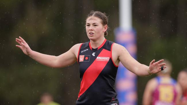 BRISBANE, AUSTRALIA - OCTOBER 02: Lily-Rose Williamson of the Bombers stands on the mark during the 2022 S7 AFLW Round 06 match between the Brisbane Lions and the Essendon Bombers at Moreton Bay Central Sports Complex on October 2, 2022 in Brisbane, Australia. (Photo by Russell Freeman/AFL Photos via Getty Images)