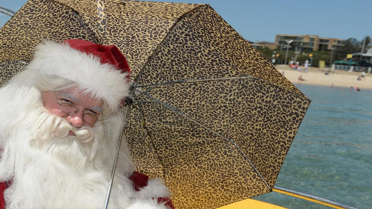 Wrap cover For Frankston Christmas Festival of Lights. Santa in Frankston. Santa carries an umbrella as Frankston is much hotter and sunnier than the North Pole. Picture: Susan Windmiller