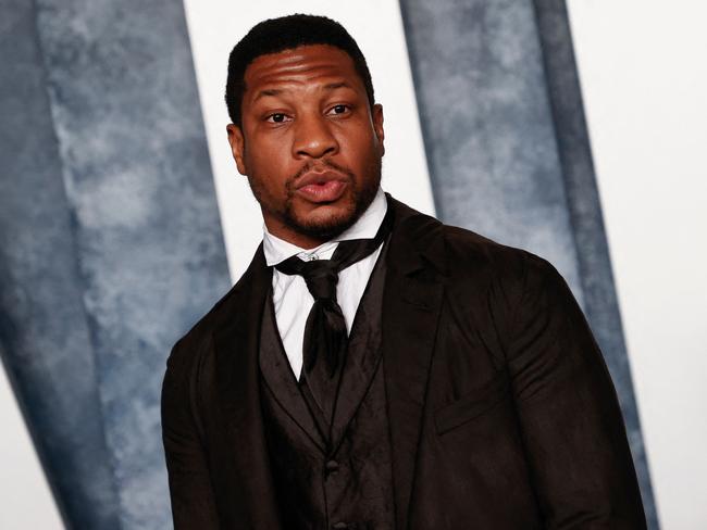 (FILES) In this file photo taken on March 13, 2023 US actor Jonathan Majors attends the Vanity Fair 95th Oscars Party at the The Wallis Annenberg Center for the Performing Arts in Beverly Hills, California. - Rising Hollywood star Jonathan Majors was detained in New York over allegations of assault, police said on March 26, 2023. Police responded to an emergency call in Manhattan late Saturday night, determining in a preliminary investigation that there was a domestic dispute between a man, 33, and a 30-year-old woman. (Photo by Michael TRAN / AFP)