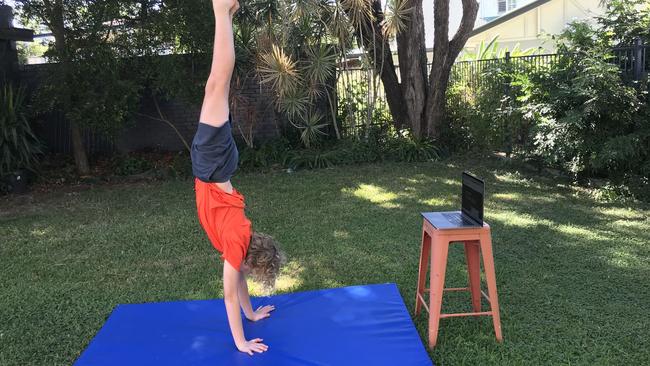 Flipside Circus performance troupe member Luke Whitefield hones his skills with the help of online training.