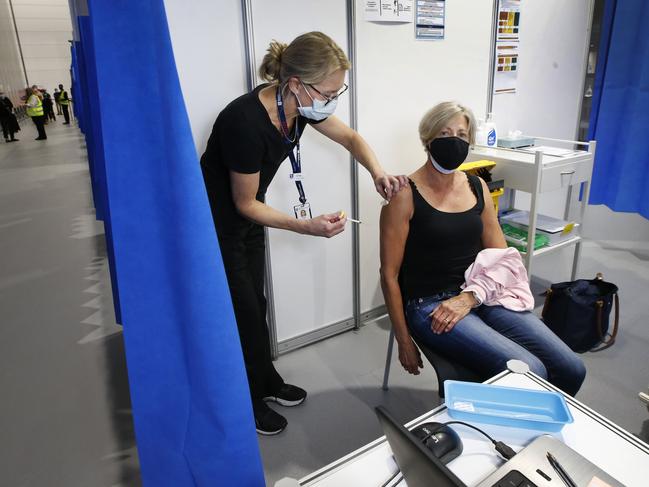 The gap between the first and second dose of the AstraZeneca vaccine must be cut from 12 to eight weeks to protect Melburnians against the Indian variant, experts have said. Picture: David Caird