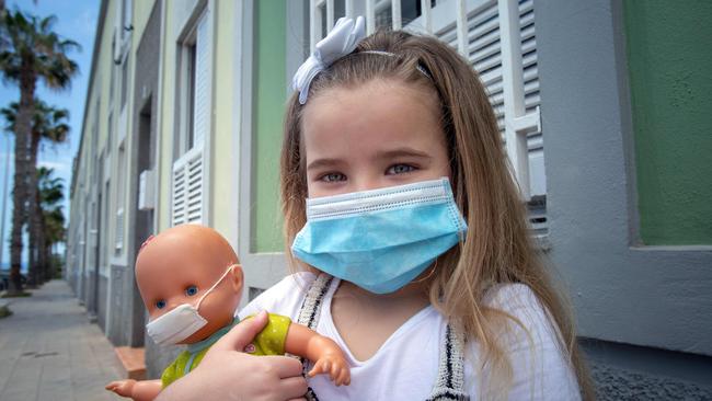 Should you be worried about coronavirus-like illness in children? Queensland Health has responded following a red alert from the UK. (Photo by DESIREE MARTIN / AFP)