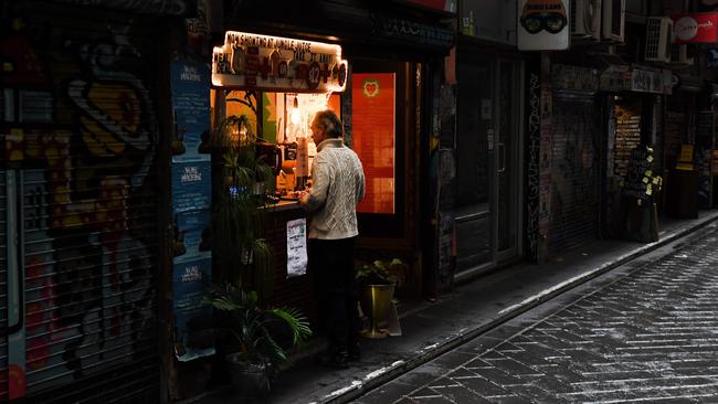 Melbourne’s cafes are expected to slowly return to normal business once restrictions have been eased. Picture: William West/AFP