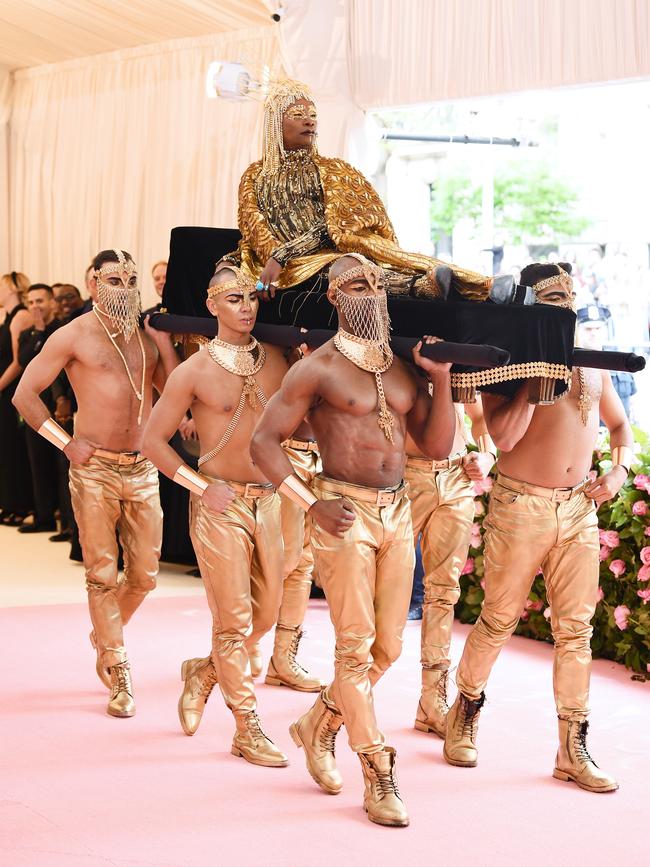 Billy Porter arrived at the Met Gala being carried by six shirtless hunks. Sadly we’re still patiently waiting for such an option to be made available on Uber. Picture: Getty.