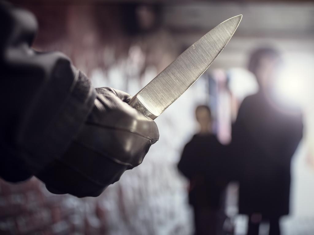 Generic crime Istock - Criminal with knife weapon threatening victims