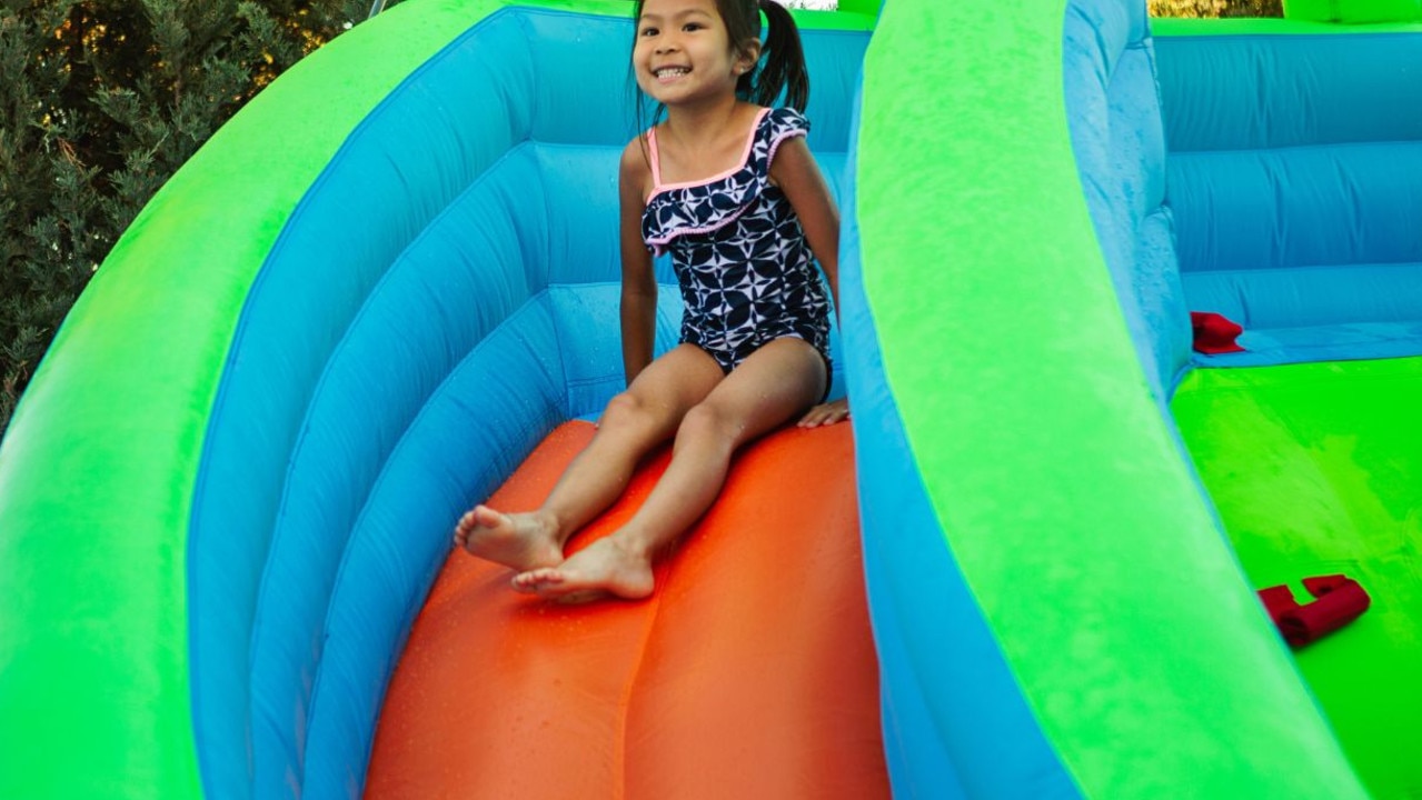 Avoid the summer traffic and turn your backyard into a water park. Picture: iStock