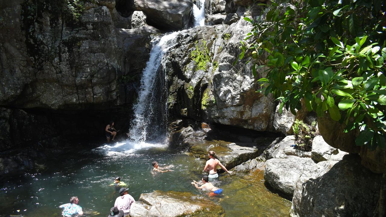 North Queenslanders flocked to Little (pictured) and Big Crystal Creeks between Townsville and Ingham and other regional watering holes to escape the extreme heat over the weekend. There was been a recent spate of injuries or death at popular Queensland waterfalls and waterholes leading to warnings ahead of the Australia Day long weekend. Picture: Cameron Bates