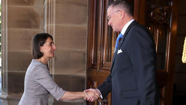 NSW Premier Gladys Berejiklian is welcomed by Official Secretary to the NSW Governor Michael Miller when she went to meet with Governor David Hurley to tell him she had secured the majority of votes in the election. Picture: AAP Image/Dan Himbrechts