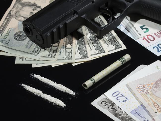 Generic photo of drugs, gun and cash. Picture: iStock