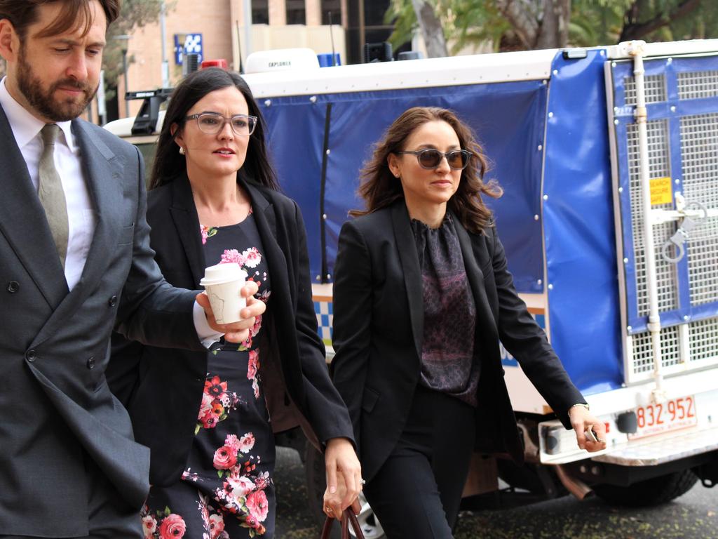 Counsel assisting Peggy Dwyer (right) arrives at the Alice Springs Local Court with Maria Walz and Patrick Coleridge on Tuesday. Picture: Jason Walls