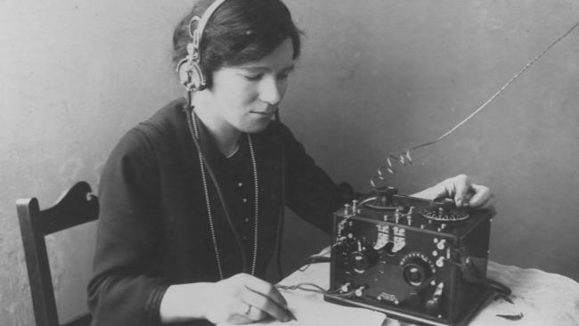 A young Violet McKenzie operating her radio set in 1922. Picture: Ex-WRANS Association