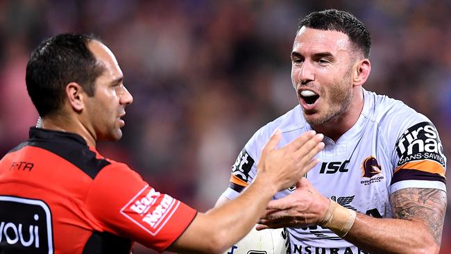 Darius Boyd of the Broncos questions the referee's decision.