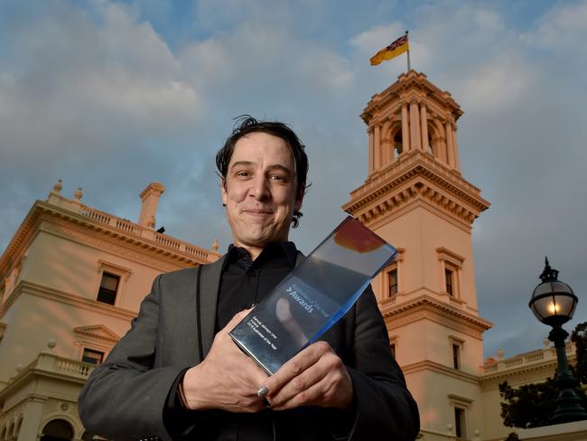 Samuel Johnson with his Victorian Australian of the Year Award. Picture: Jay Town