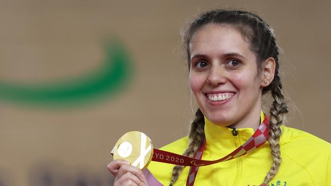 IZU, JAPAN - AUGUST 27: Gold medalist Amanda Reid of Team Australia celebrates on the podium during the medal ceremony for the Track Cycling Women's C1-2-3 500m Time Trial on day 3 of the Tokyo 2020 Paralympic Games at Izu Velodrome on August 27, 2021 in Izu, Shizuoka, Japan. (Photo by Kiyoshi Ota/Getty Images)