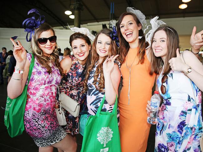 Racegoers return to the city after Melbourne Cup Day 2014 at Flemington Racecourse. Picture: Nathan Dyer