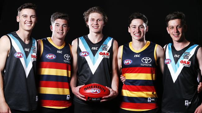 Connor Rozee of the Power, Ned McHenry of the Crows, Xavier Duursma of the Power, Chayce Jones of the Crows and Zak Butters of the Power during the 2018 AFL Draft at Marvel Stadium. Picture: AAP Image/Daniel Pockett