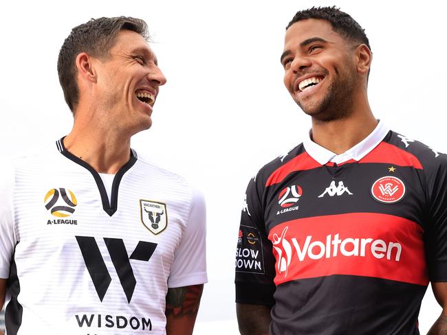 SYDNEY, AUSTRALIA - DECEMBER 14: Mark Milligan of Macarthur FC poses with Kwame Yeboah of Western Sydney Wanderers during the Fox Sports A League season Launch at Darling Harbour on December 14, 2020 in Sydney, Australia. (Photo by Mark Evans/Getty Images)